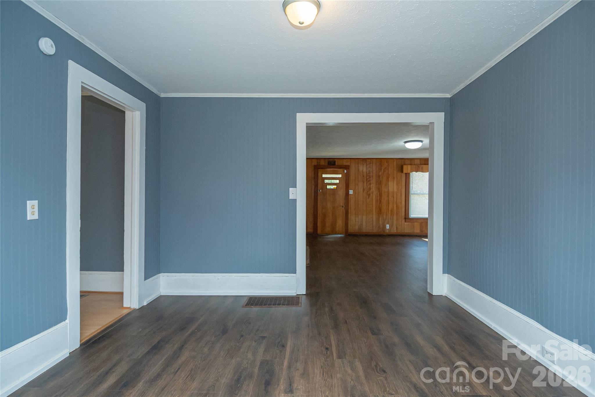 761 Amherst Road Morganton, NC 28655 - Photo 18 of 31 a view of a hallway with wooden floor