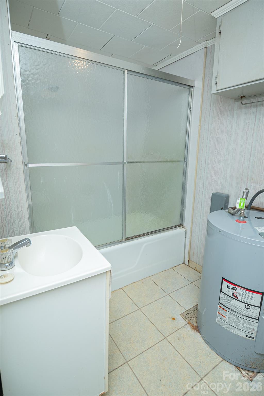 761 Amherst Road Morganton, NC 28655 - Photo 19 of 31 a bathroom with a shower and a sink