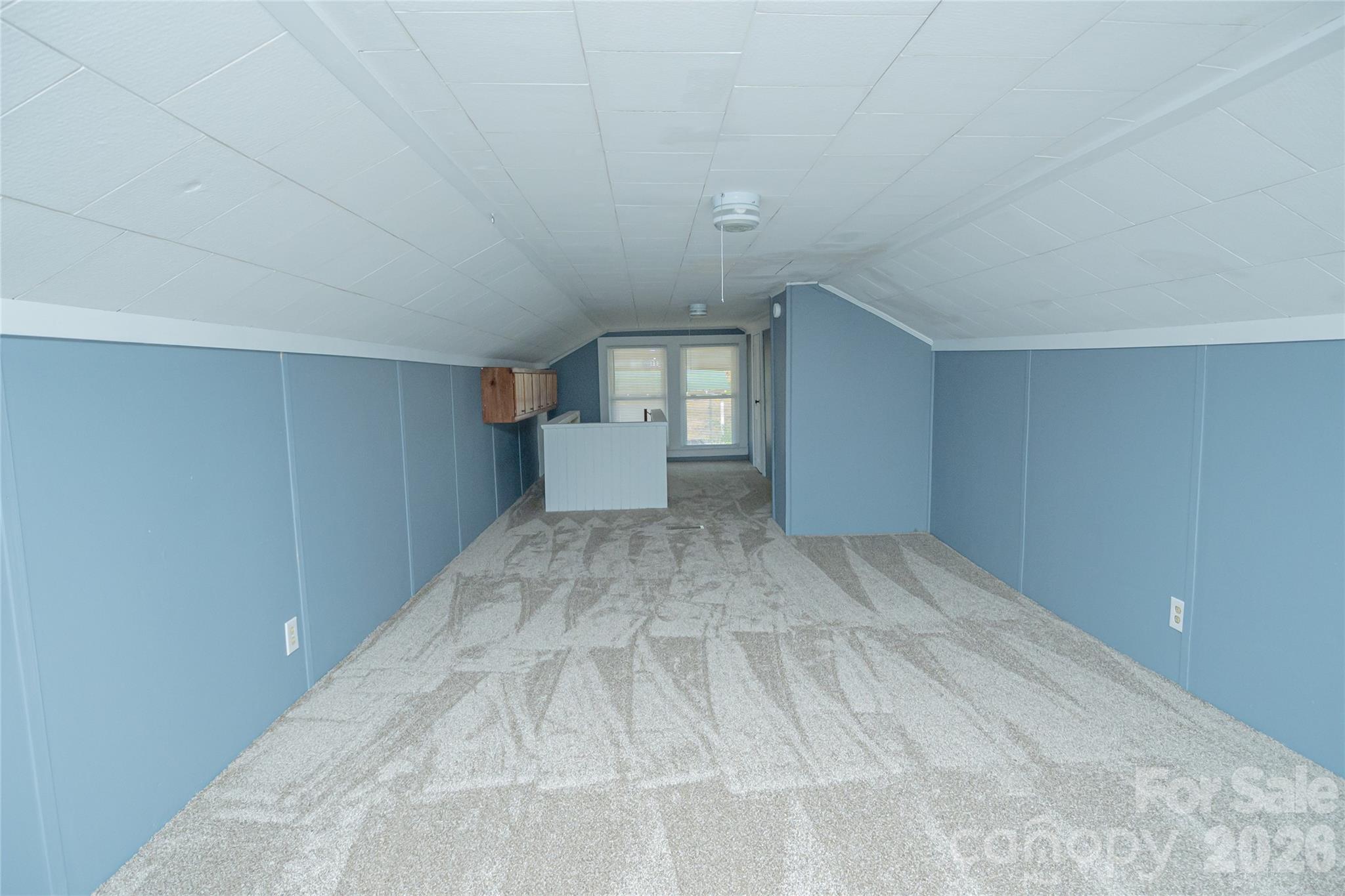 761 Amherst Road Morganton, NC 28655 - Photo 28 of 31 a view of empty room with windows