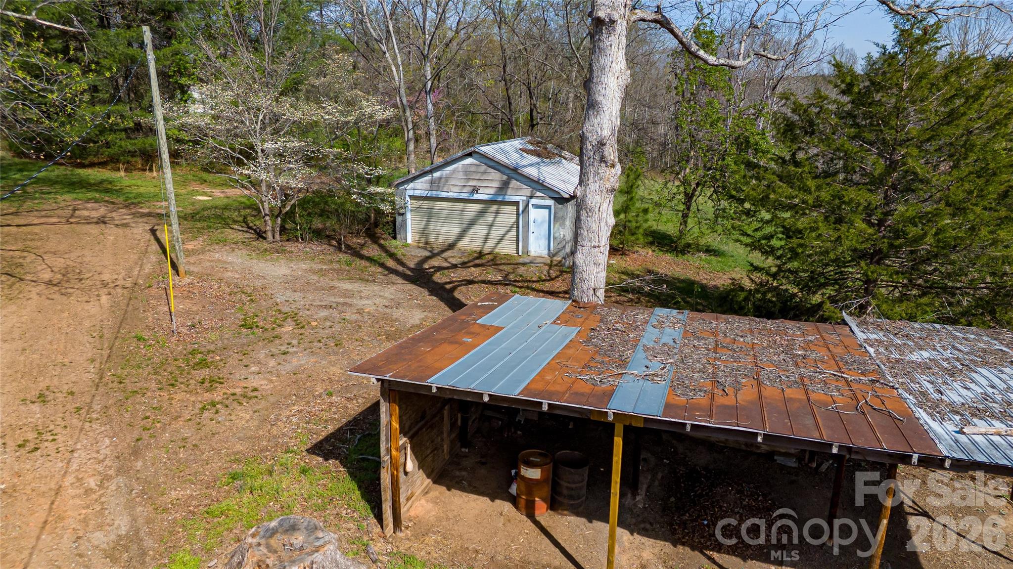 761 Amherst Road Morganton, NC 28655 - Photo 30 of 31 a view of a backyard with sitting area