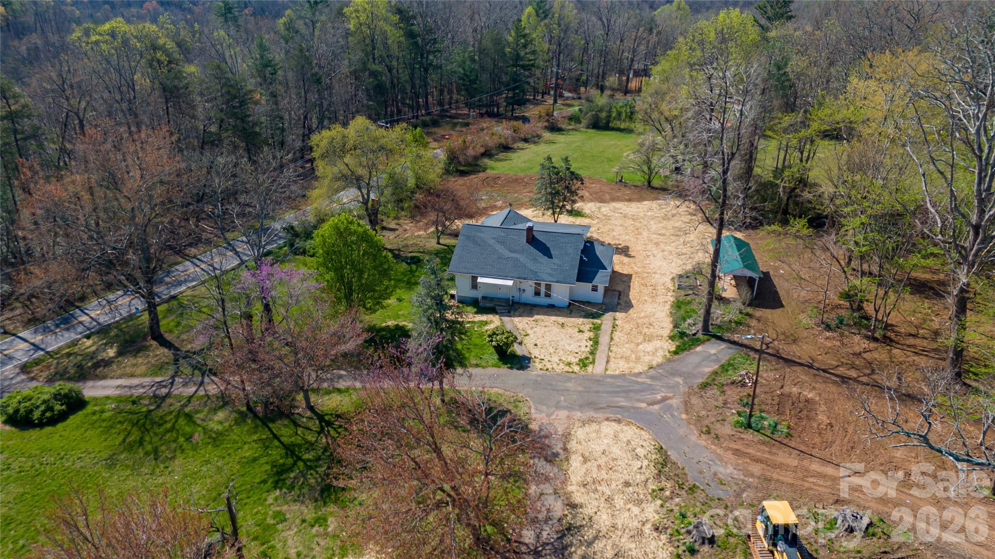 761 Amherst Road Morganton, NC 28655 - Photo 7 of 31 a view of a house with a yard