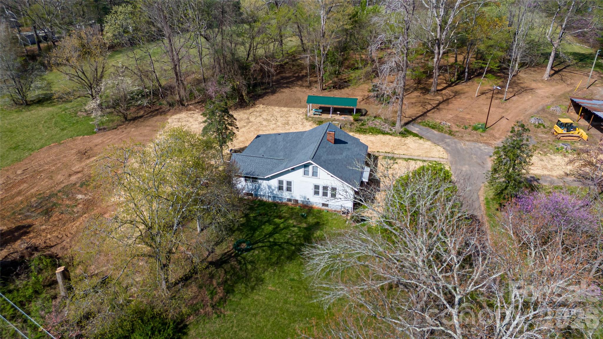 761 Amherst Road Morganton, NC 28655 - Photo 9 of 31 a view of a house with a yard