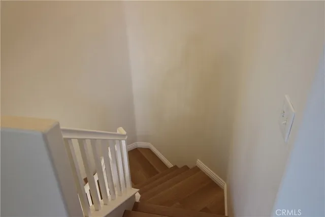 a swimming pool with outdoor seating and yard