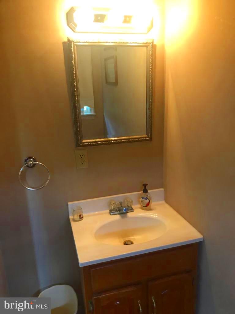 7547 Libertytown Road Berlin, MD 21811 - Photo 13 of 19 Half bath just inside back door in mud room