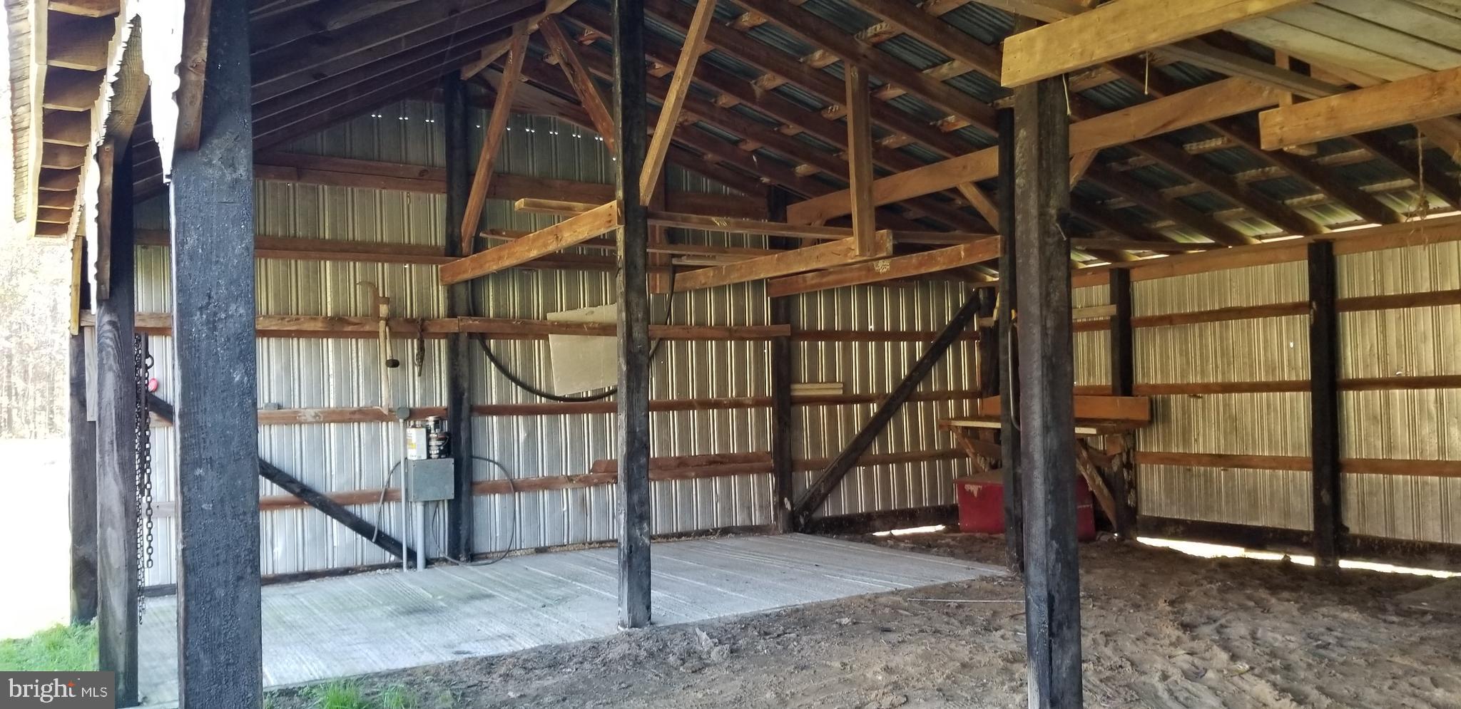 7547 Libertytown Road Berlin, MD 21811 - Photo 18 of 19 concrete pad in one bay with electric