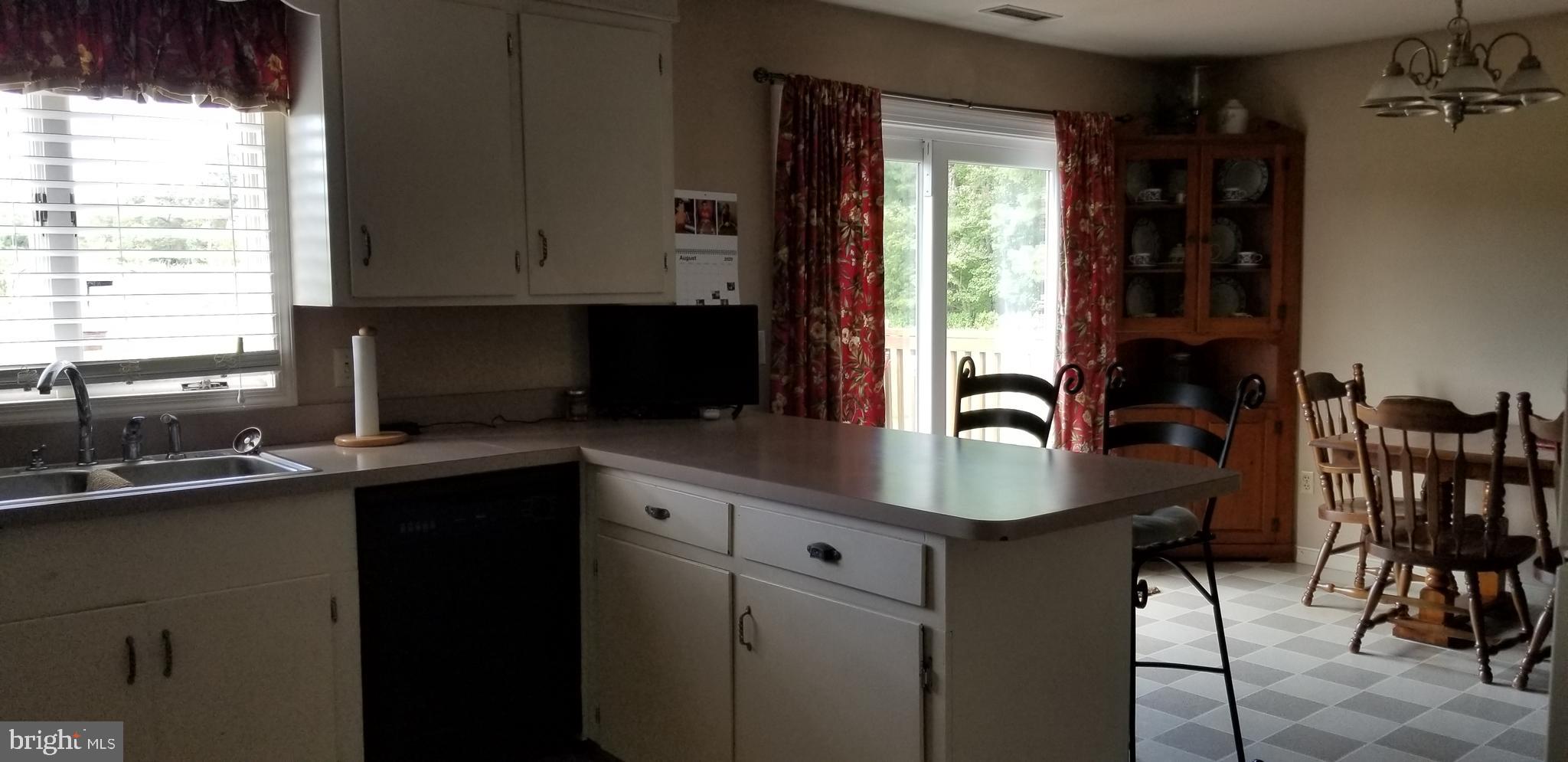 7547 Libertytown Road Berlin, MD 21811 - Photo 5 of 19 Kitchen views out back to field