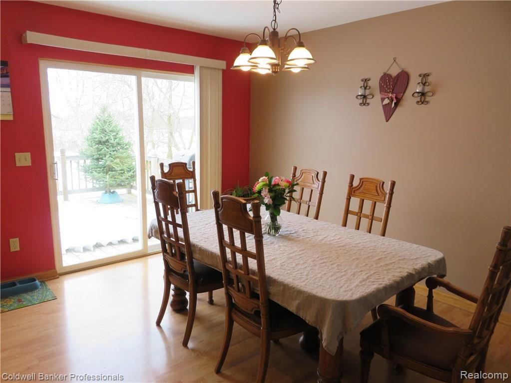 9389 South Cork Road Morrice, MI 48857 - Photo 6 of 16 8 9389 Dining Room (1).jpg
