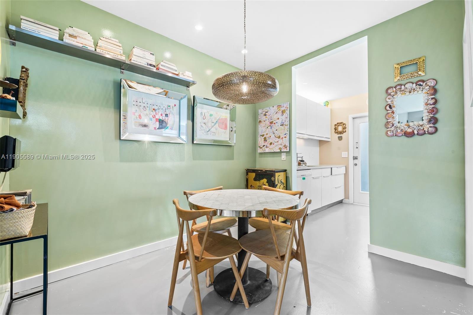 823 Jefferson Avenue, Unit 6 Miami Beach, FL 33139 - Photo 11 of 13 a view of a dining room with furniture