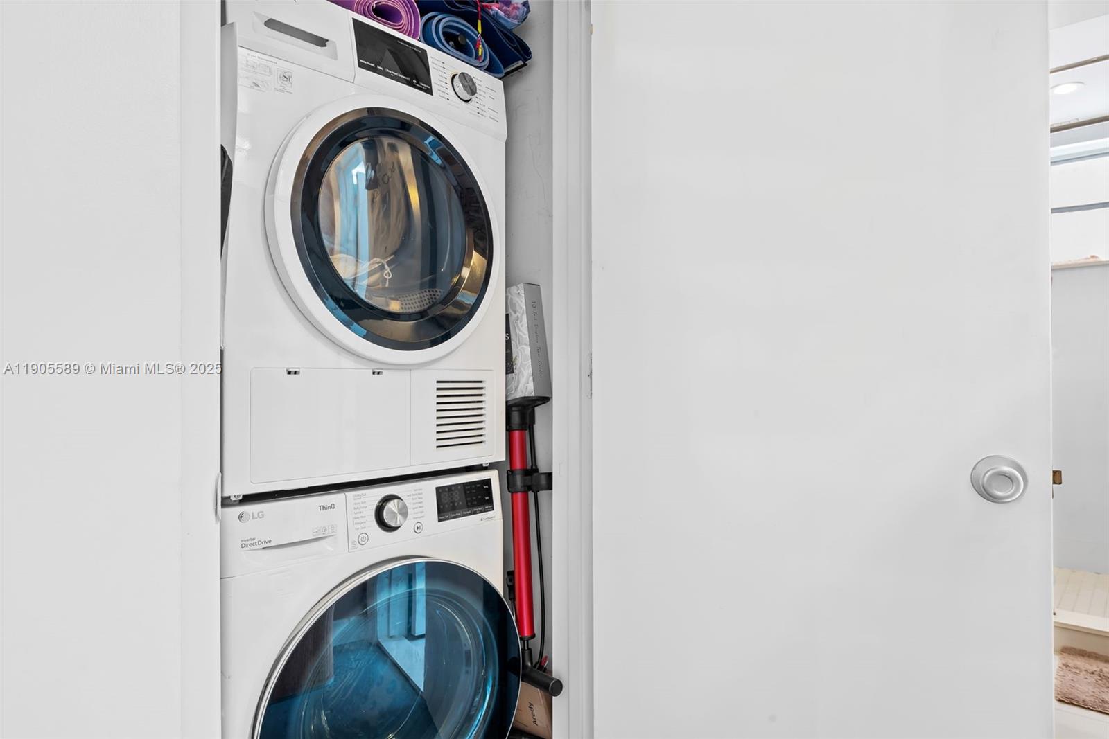 823 Jefferson Avenue, Unit 6 Miami Beach, FL 33139 - Photo 12 of 13 a utility room with dryer and washer