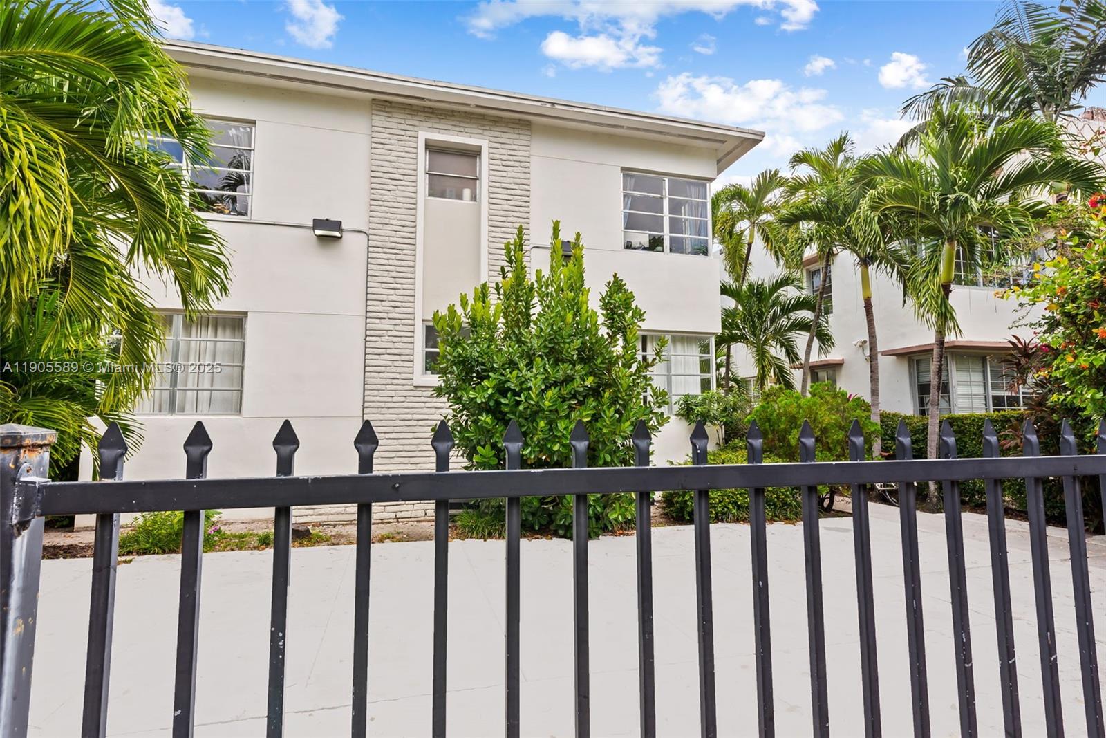 823 Jefferson Avenue, Unit 6 Miami Beach, FL 33139 - Photo 13 of 13 a view of a house with a small yard