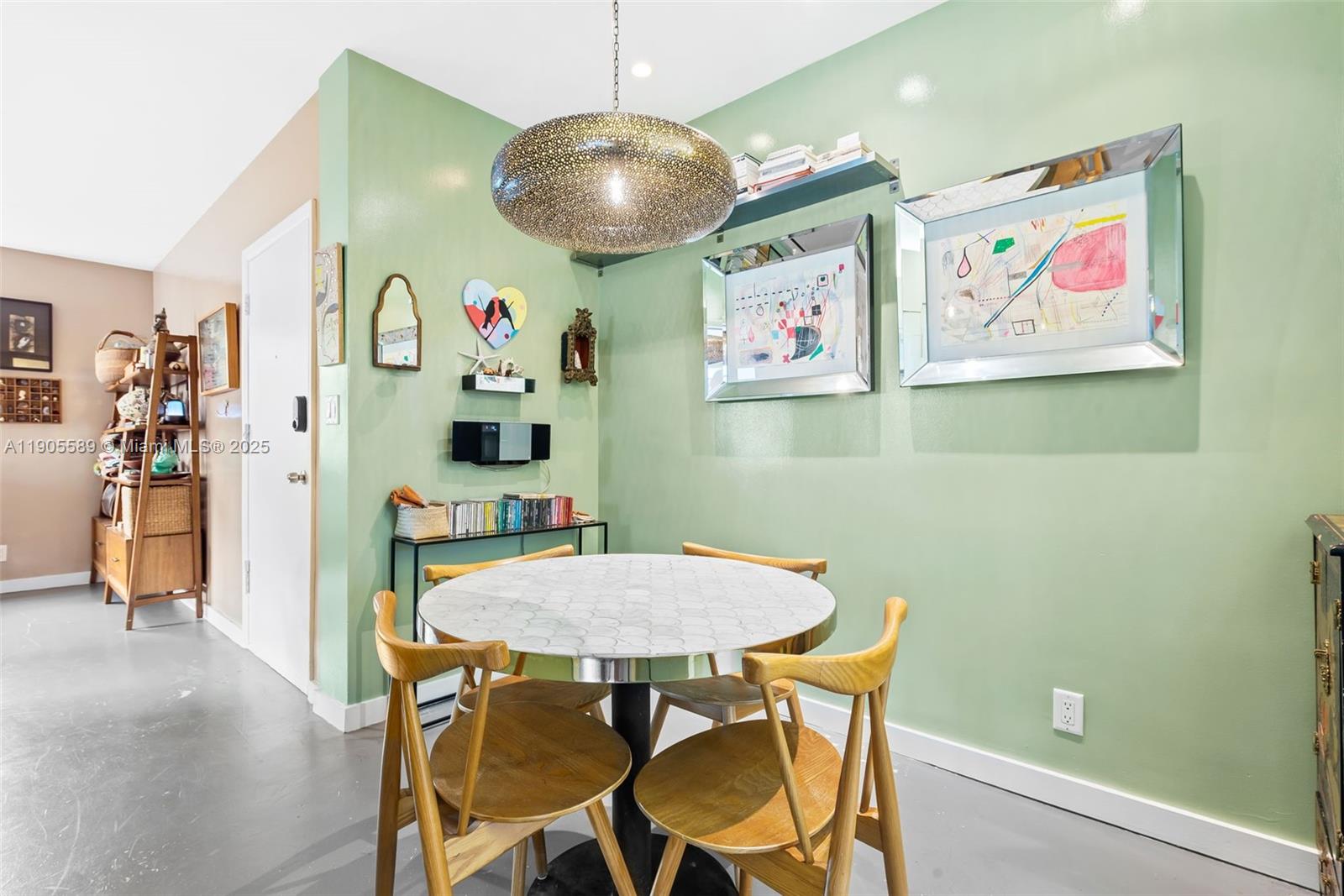 823 Jefferson Avenue, Unit 6 Miami Beach, FL 33139 - Photo 10 of 13 a view of a dining room with furniture