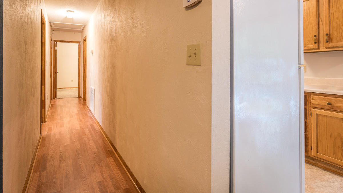 1136 Quarry Road Blue Ridge, VA 24064 - Photo 14 of 29 a view of a hallway with wooden floor