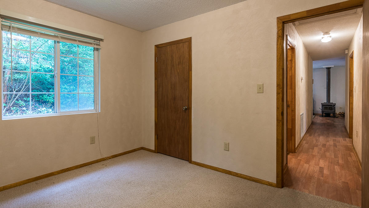 1136 Quarry Road Blue Ridge, VA 24064 - Photo 16 of 29 an empty room that has a window