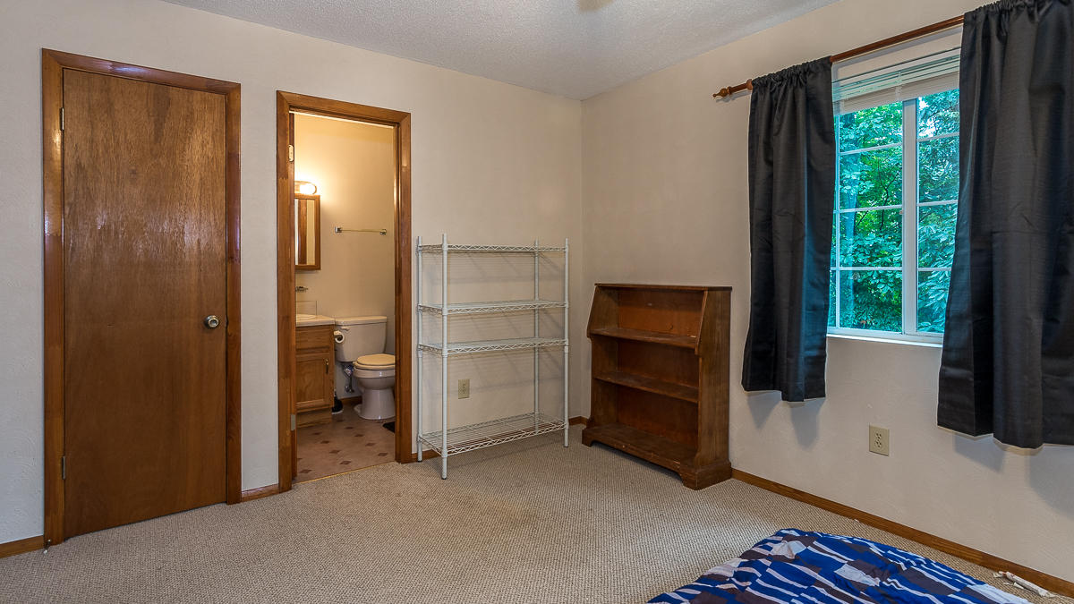1136 Quarry Road Blue Ridge, VA 24064 - Photo 18 of 29 a room with a walk in closet and a window