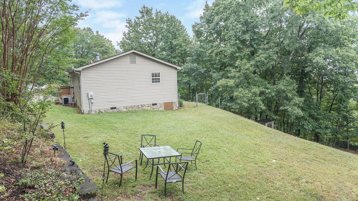 1136 Quarry Road Blue Ridge, VA 24064 - Photo 25 of 29 a view of a backyard with plants area