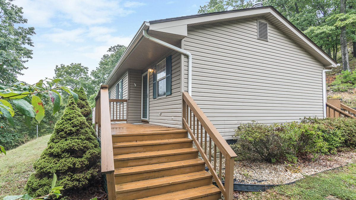 1136 Quarry Road Blue Ridge, VA 24064 - Photo 4 of 29 a view of a house with a yard