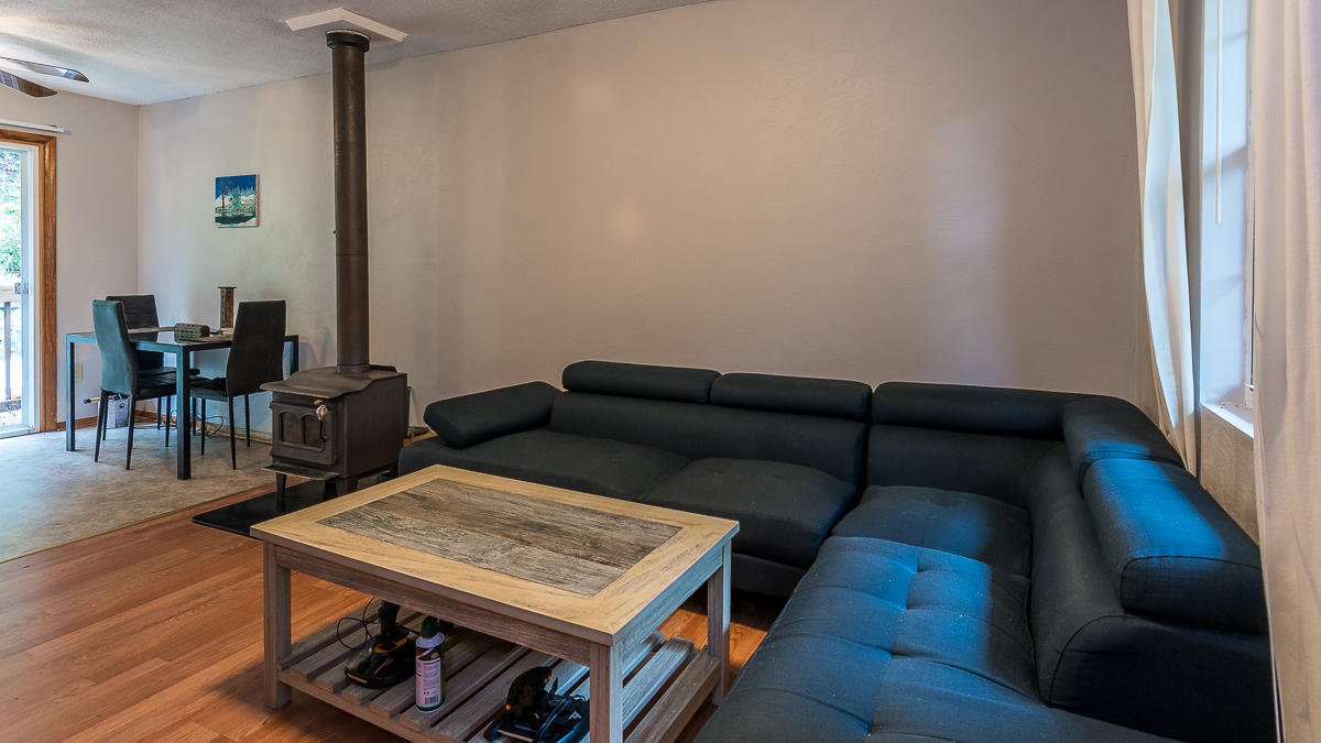 1136 Quarry Road Blue Ridge, VA 24064 - Photo 6 of 29 a living room with furniture and a wooden floor