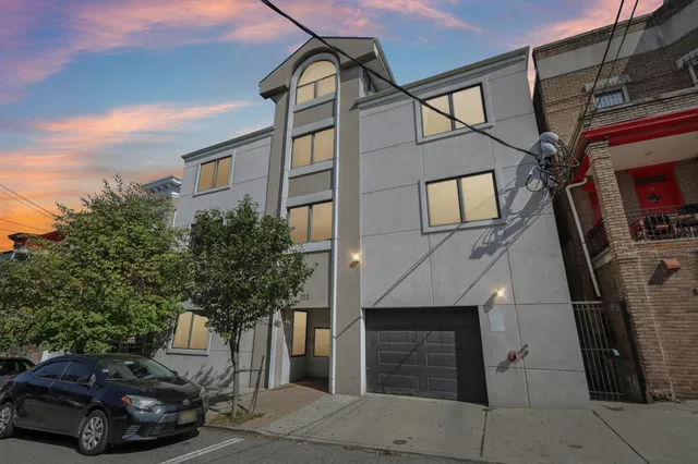 a car parked in front of a house