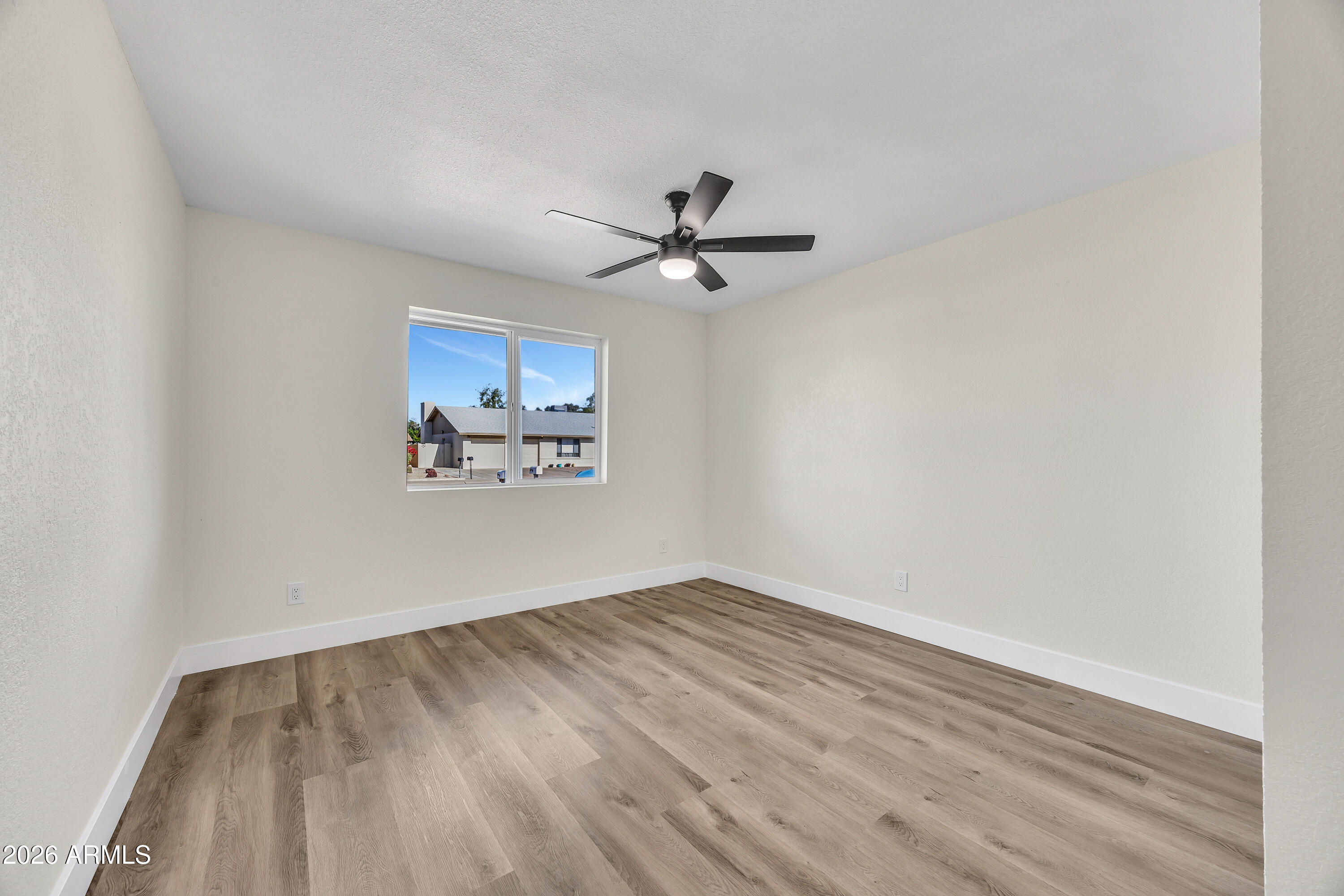 2123 East Radcliffe Drive Tempe, AZ 85283 - Photo 17 of 25 wooden floor in a empty room