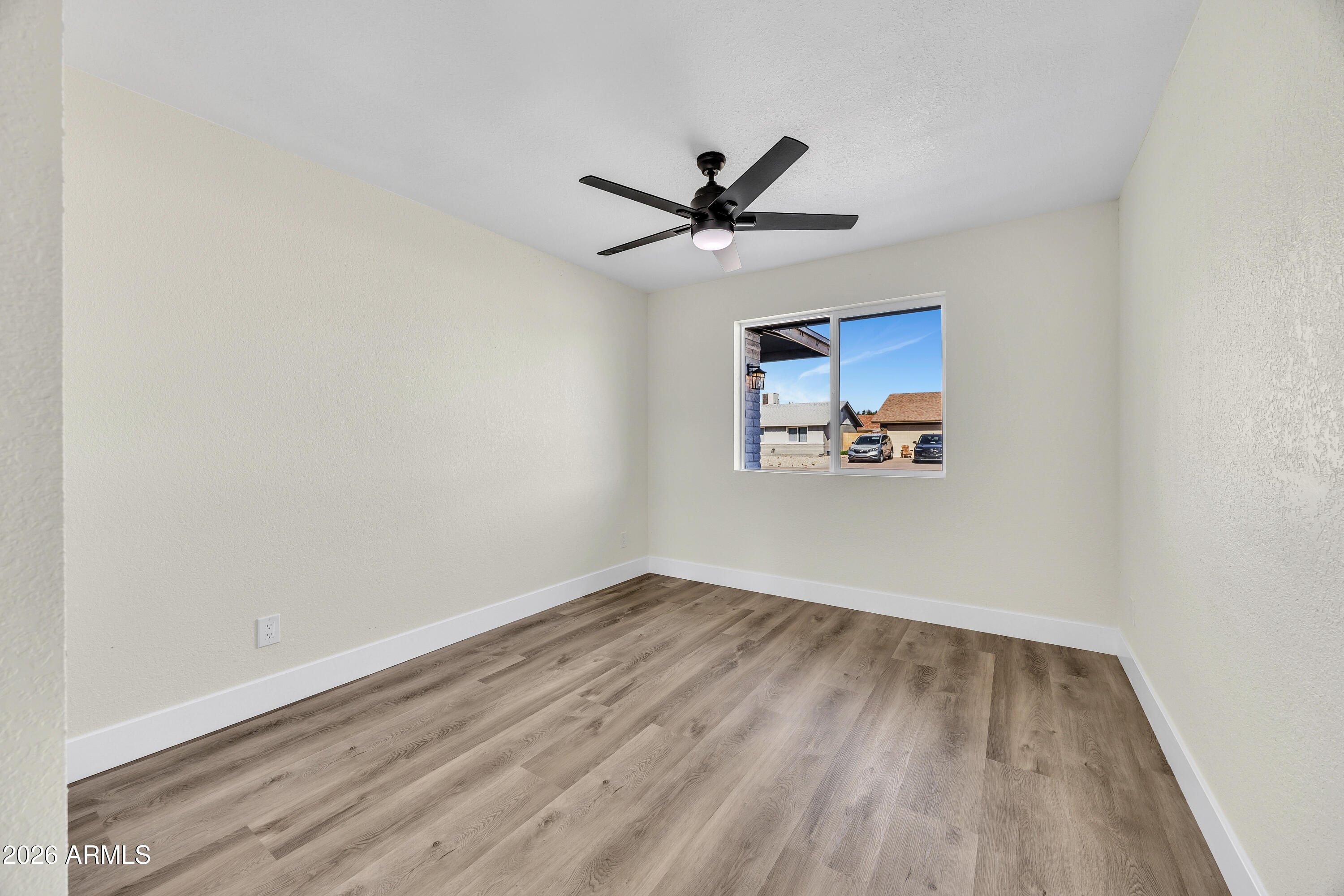 2123 East Radcliffe Drive Tempe, AZ 85283 - Photo 19 of 25 a view of a room with wooden floor