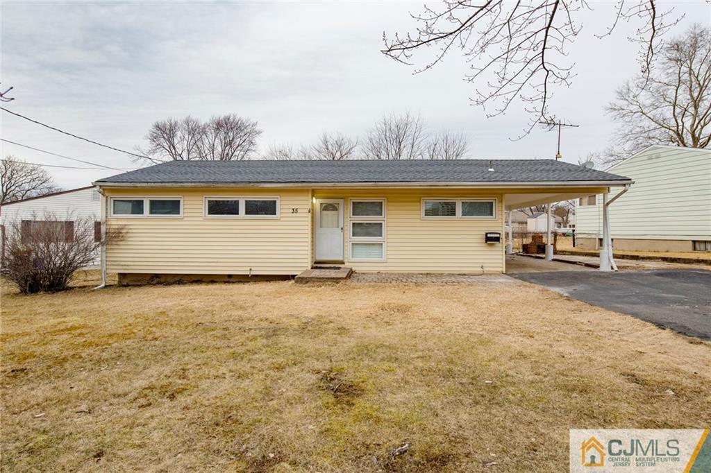 35 Purdue Road Old Bridge, NJ 08859 - Photo 1 of 21 a house view with a backyard space
