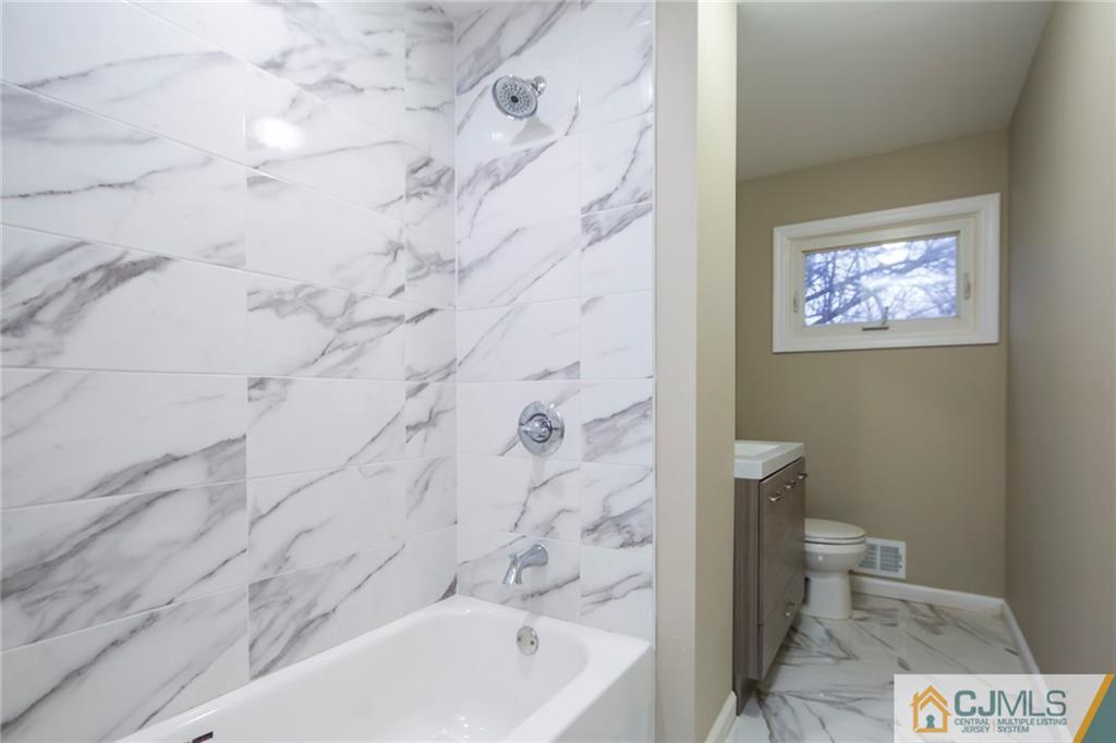 35 Purdue Road Old Bridge, NJ 08859 - Photo 12 of 21 a bathroom with a bathtub and a toilet