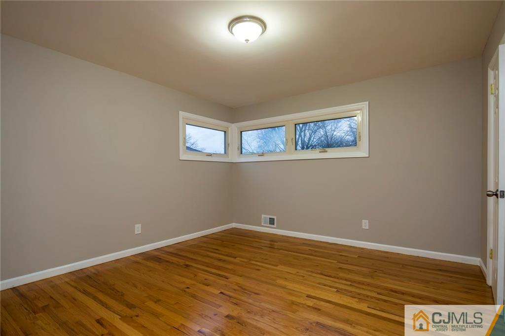 35 Purdue Road Old Bridge, NJ 08859 - Photo 13 of 21 a view of empty room with wooden floor