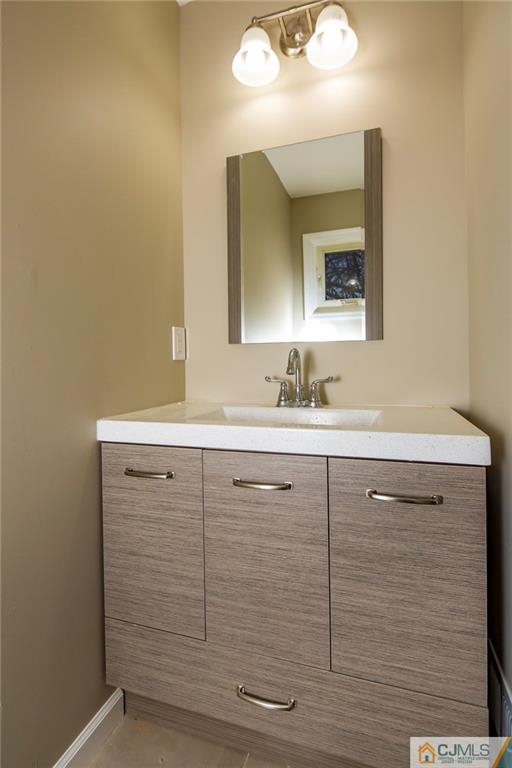 35 Purdue Road Old Bridge, NJ 08859 - Photo 15 of 21 a bathroom with a sink vanity and mirror