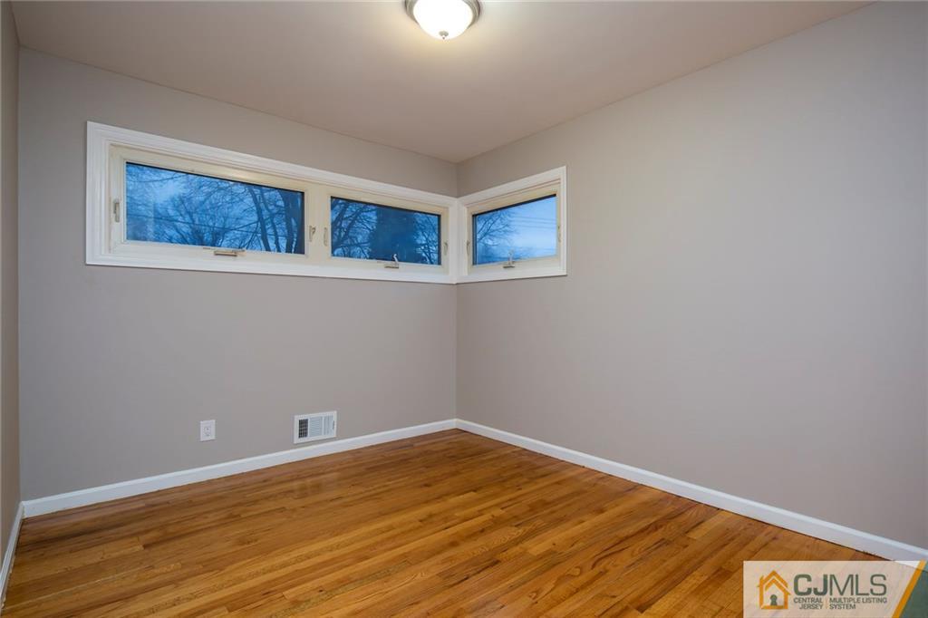 35 Purdue Road Old Bridge, NJ 08859 - Photo 16 of 21 a view of an empty room with wooden floor