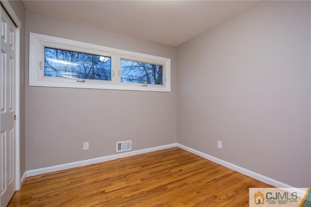 35 Purdue Road Old Bridge, NJ 08859 - Photo 17 of 21 a view of empty room with wooden floor