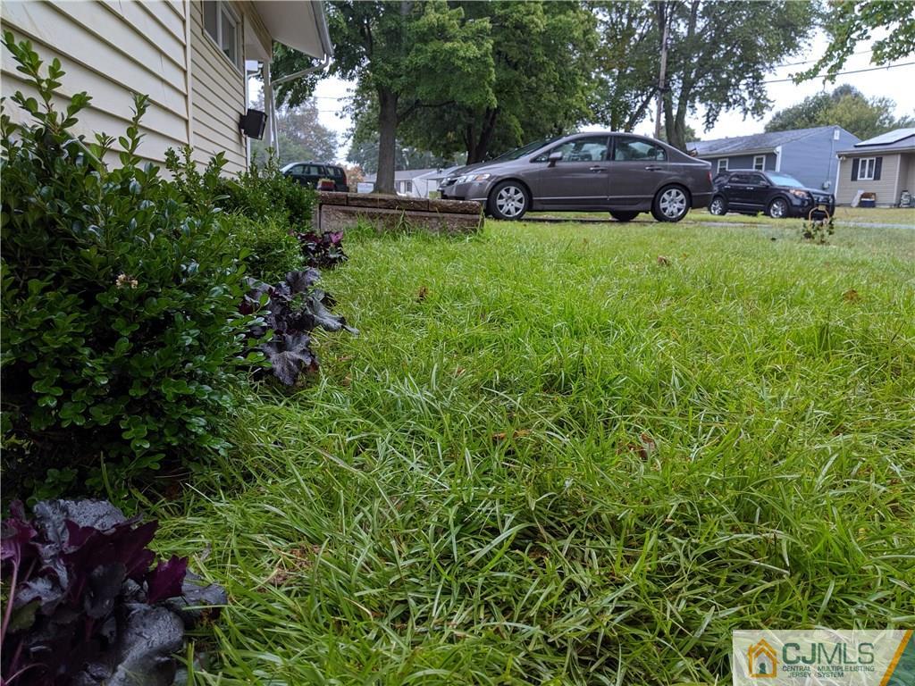 35 Purdue Road Old Bridge, NJ 08859 - Photo 5 of 21 a view of a backyard with plants and a garden