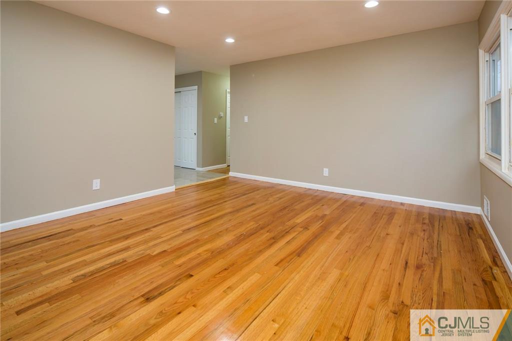 35 Purdue Road Old Bridge, NJ 08859 - Photo 10 of 21 a view of an empty room with wooden floor