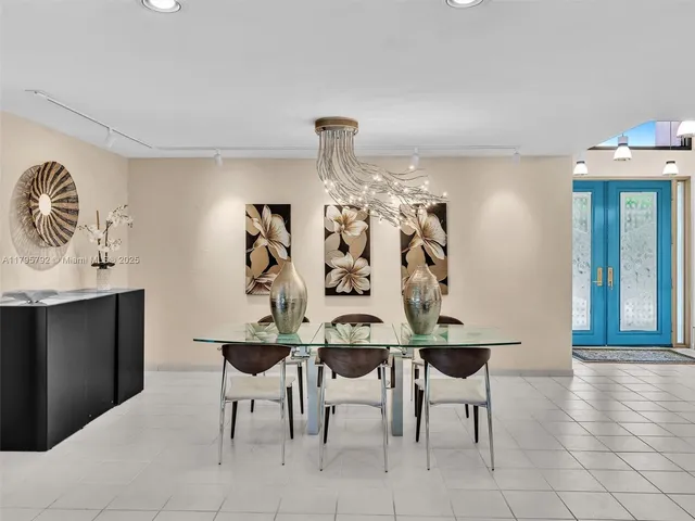 an empty room with closet and windows