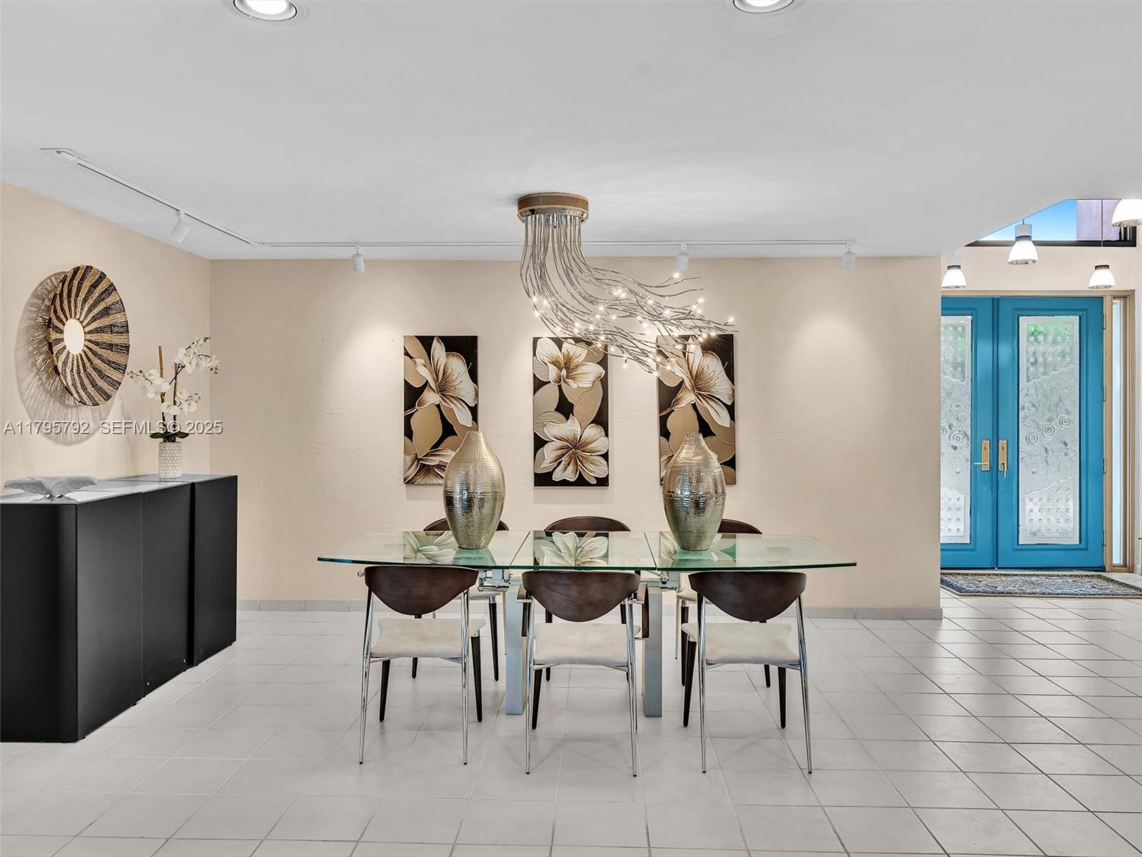 13494 Stirling Road Southwest Ranches, FL 33330 - Photo 16 of 79 a view of a dining room with furniture and wooden floor