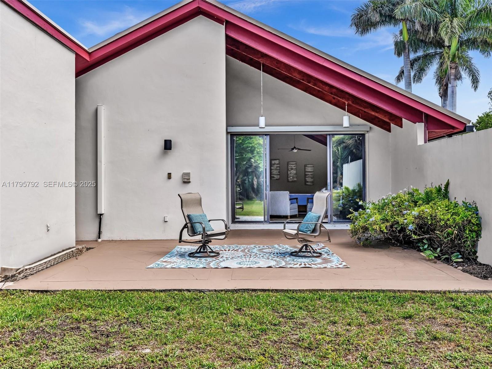 13494 Stirling Road Southwest Ranches, FL 33330 - Photo 37 of 79 a view of a backyard with a patio