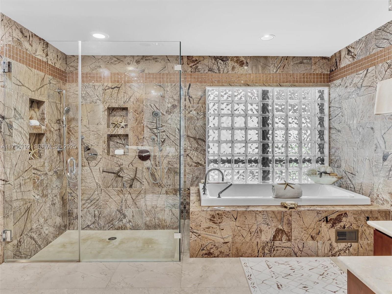 13494 Stirling Road Southwest Ranches, FL 33330 - Photo 42 of 79 a bathroom with a bathtub and shower