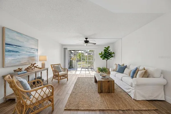 a view of a porch with wooden floor