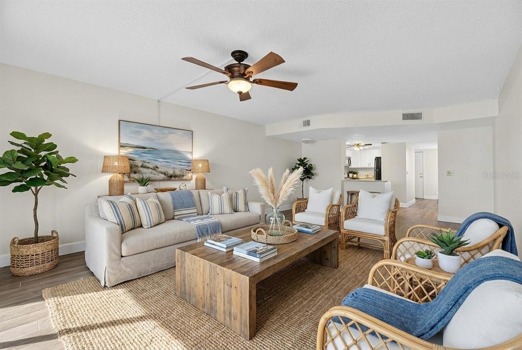 1028 Apollo Beach Boulevard, Unit 23 Apollo Beach, FL 33572 - Photo 25 of 86 a living room with furniture and a potted plant