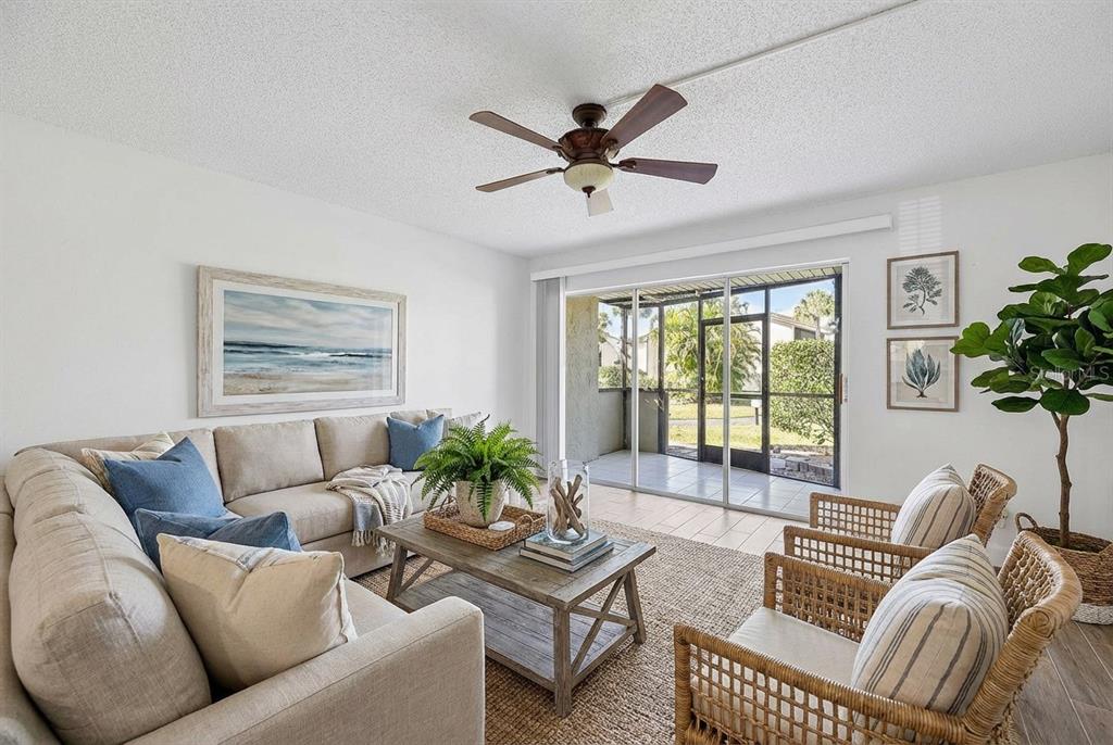 1028 Apollo Beach Boulevard, Unit 23 Apollo Beach, FL 33572 - Photo 32 of 86 a living room with furniture and a large window
