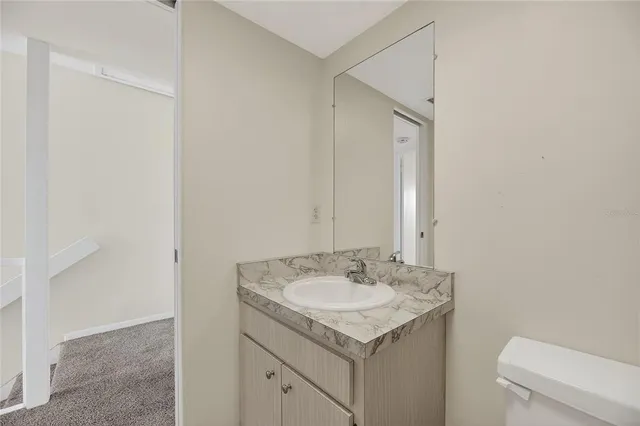 an aerial view of a house with outdoor space