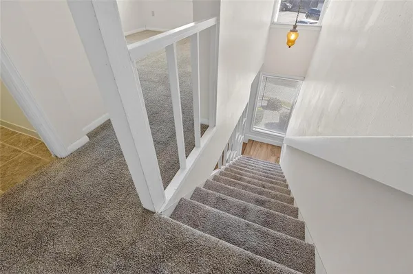 a view of roof deck with patio