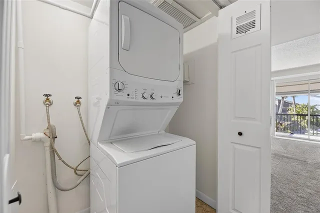 an aerial view of a house with a garden and plants