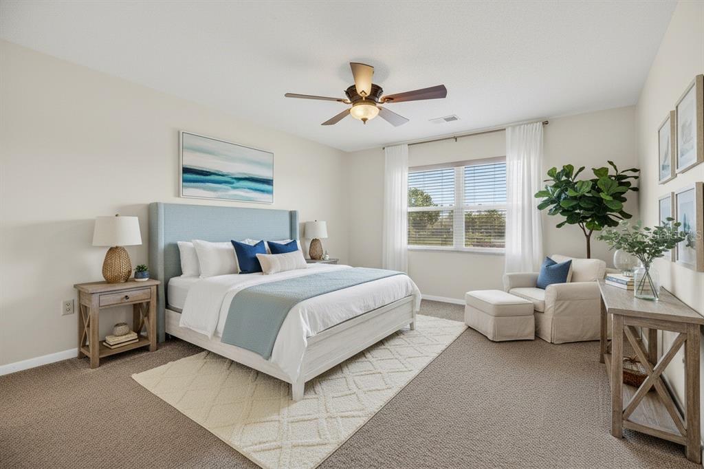 1028 Apollo Beach Boulevard, Unit 23 Apollo Beach, FL 33572 - Photo 47 of 86 a bedroom with a bed and a couch