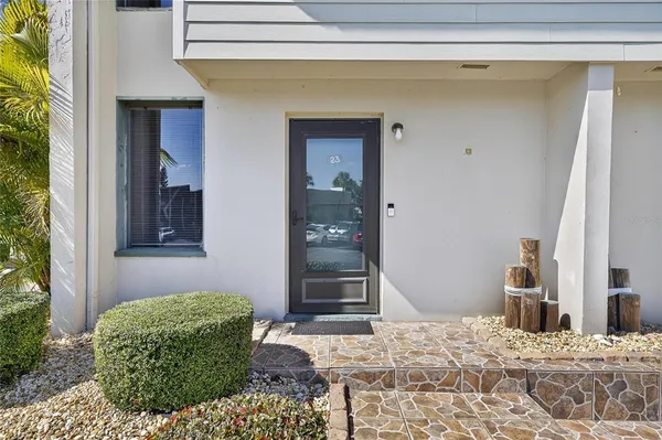 a bathroom with a sink a mirror and vanity