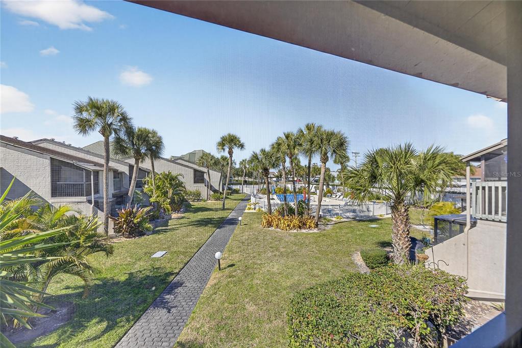 1028 Apollo Beach Boulevard, Unit 23 Apollo Beach, FL 33572 - Photo 66 of 86 a view of a swimming pool and outdoor space