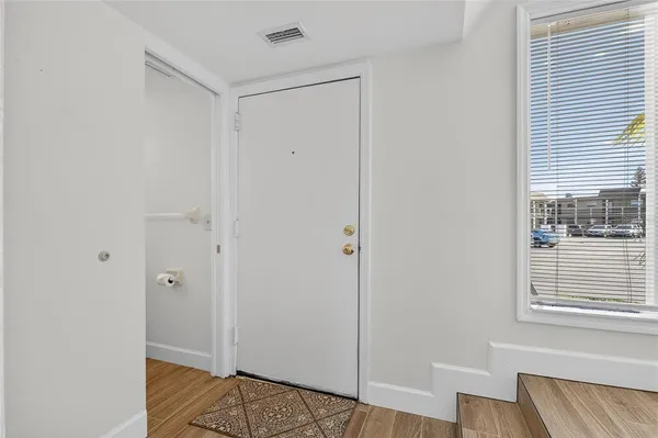 a kitchen with stainless steel appliances a sink stove and refrigerator