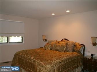 51 Tulip Road Southampton, PA 18966 - Photo 9 of 12 a bedroom with a bed and a window