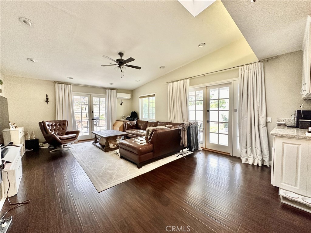 2138 Clear Springs Road Brea, CA 92821 - Photo 2 of 10 a living room with furniture floor to ceiling window and wooden floor