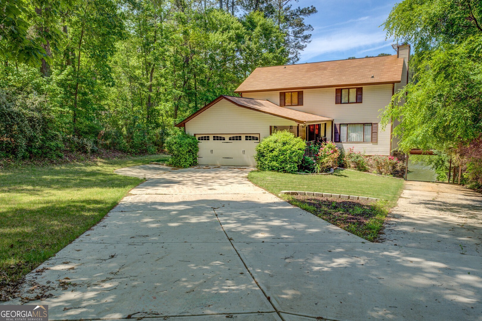 71 Canvasback Court Monticello, GA 31064 - Photo 11 of 79 a front view of a house with a yard