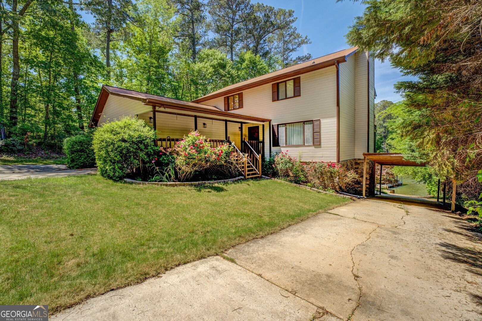 71 Canvasback Court Monticello, GA 31064 - Photo 12 of 79 a front view of a house with garden